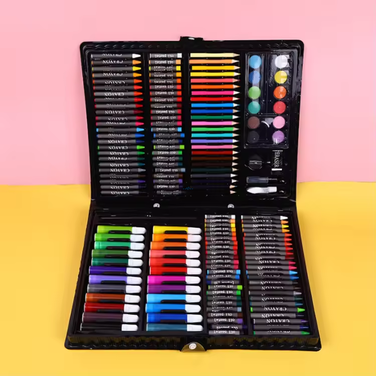 Child and adult drawing together with the art set