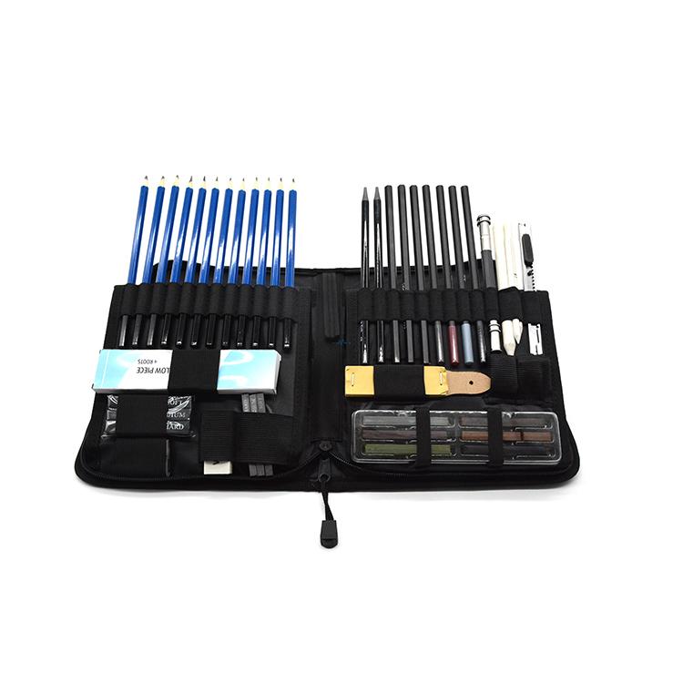Open sketch kit showing organized graphite pencils, charcoal sticks and zippered case compartments  