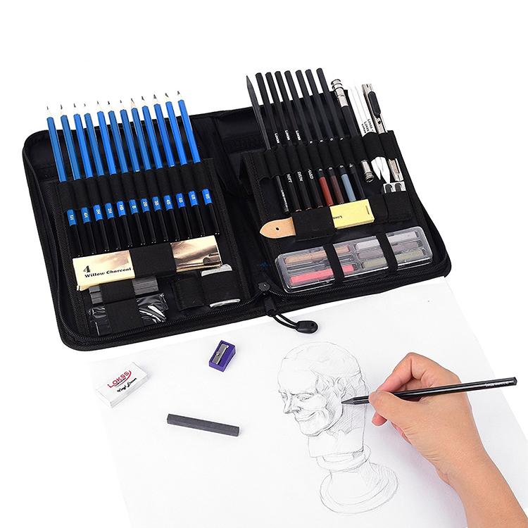 Open sketch kit showing organized graphite pencils, charcoal sticks and zippered case compartments  
